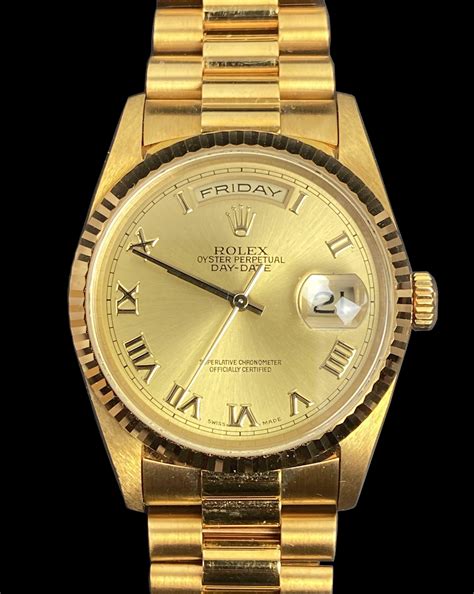 Rolex oyster perpetual date gold